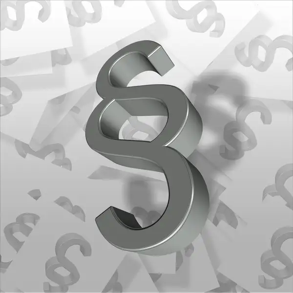 علامة الفقرة القانونية على خلفية كتاب قانون، تعبيرًا عن الشروط وقواعد الدول التي تُبقي Coinbase مغلقة أمام المقيمين في السعودية